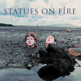 Living In Darkness Statues On Fire